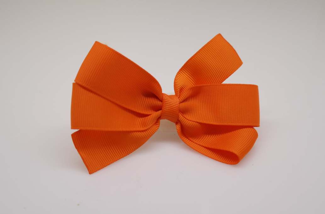 Large pinwheel hair Bow with colors  Russet Orange